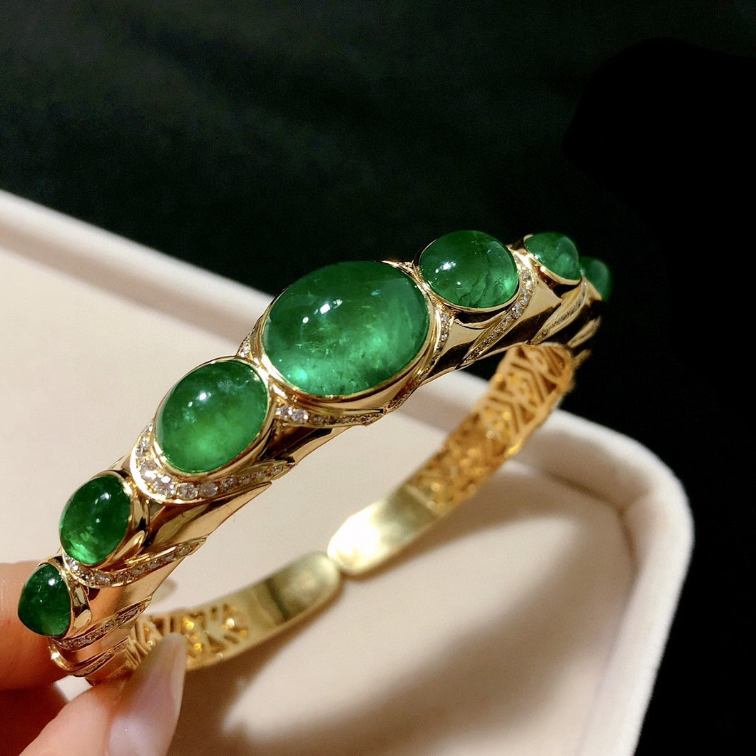 GRC Certified 22.908ctw Natural Emerald & Diamond Bangle